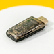 The tiny Genki ShadowCast dongle down converts up to 4K HDMI video signals so they can be displayed on a laptop’s screen via USB-C.